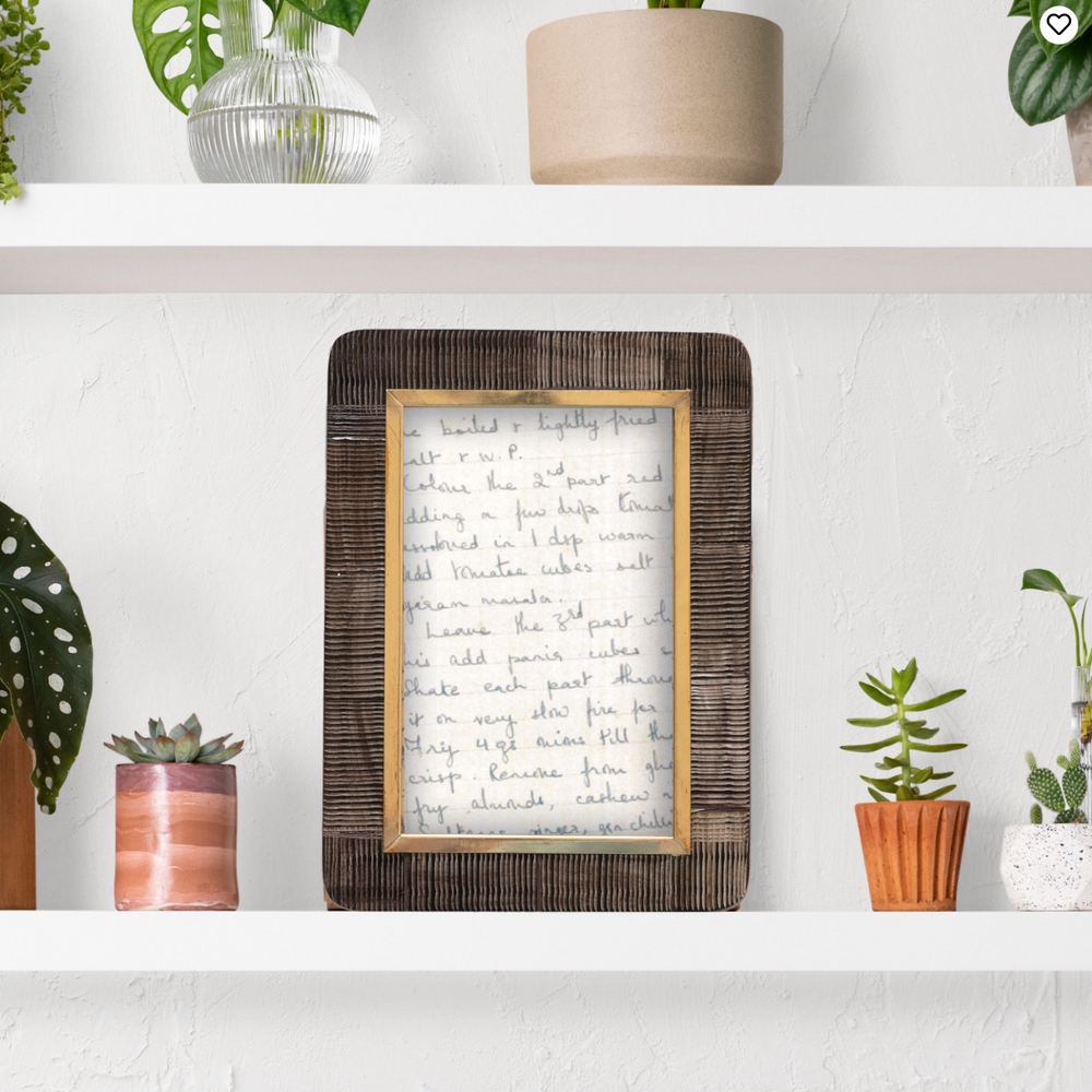 
                      
                        Hand-Carved Photo Frame with Brass Border
                      
                    
